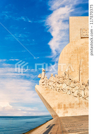 Monument to Discoveries or Padrao dos Descobrimentos to Age of Discovery, shaped as ship and sword, with statues of Prince Henry the Navigator and great people of Portuguese seafarers history, Lisbon 117870375