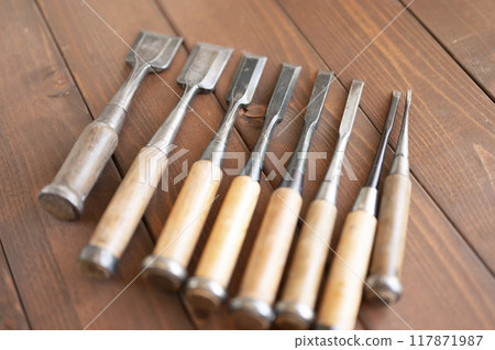 A well-used chisel set A well-used chisel set 117871987
