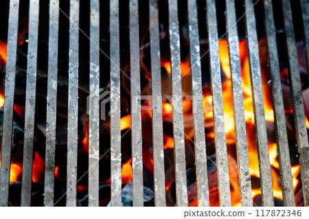 Embers Glow Through Grill Grates Embers Glow Through Grill Grates 117872346