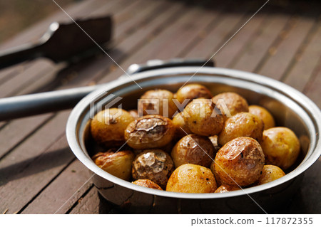 Golden Roasted Potatoes in a Bowl Golden Roasted Potatoes in a Bowl 117872355