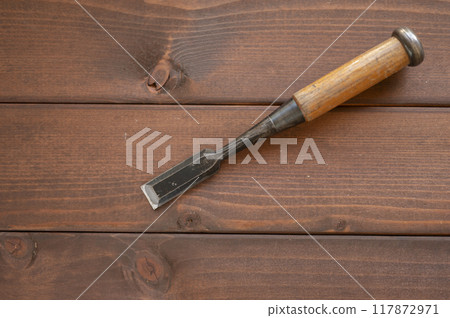 A well-used eight-minute chisel 117872971