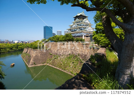 Osaka castle with walls and a moat., Osaka - Japan 117874552