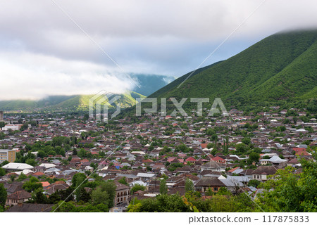 View of Shaki City in Azerbaijan Under Cloudy Skies Surrounded by Lush Greenery View of Shaki City in Azerbaijan Under Cloudy Skies Surrounded by Lush Greenery 117875833