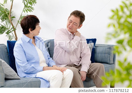 Stiff shoulders Senior man Couple 117878212