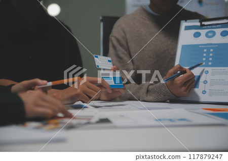 Professional interior designer at workplace in office, closeup 117879247