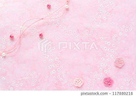 Pink cloud dragon Japanese paper with small floral pattern and Mizuhiki craft background 117880218