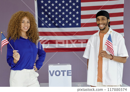 People With American Flags At Election Day 117880374
