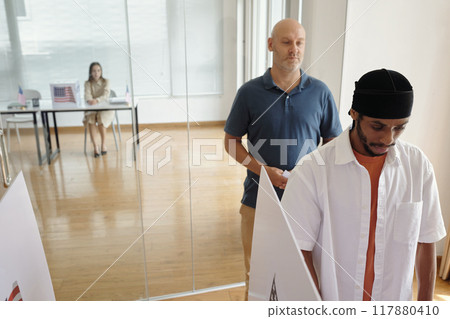 Men Voting During Election Day Men Voting During Election Day 117880410