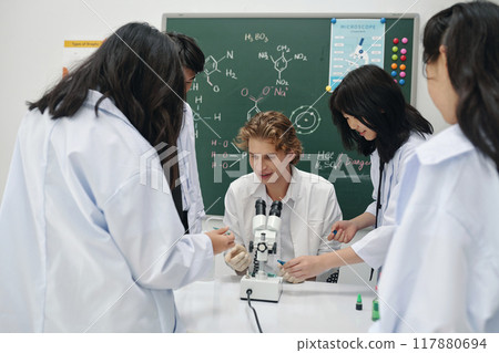 Students Conducting Experiment in Science Lab Students Conducting Experiment in Science Lab 117880694