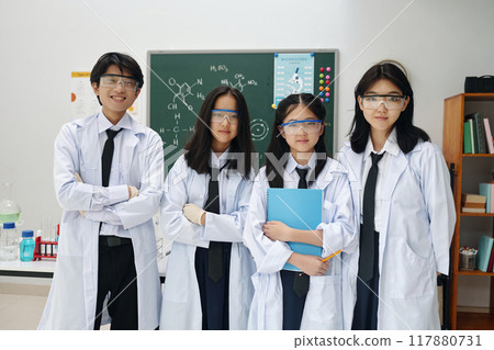 Group of Asian Science Students Wearing Lab Coats and Glasses 117880731