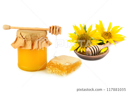 Honey pot, honeycomb and wooden drizzler isolated on white . Collage. Honey pot, honeycomb and wooden drizzler isolated on white . Collage. 117881035