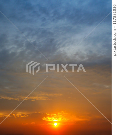 The morning sky looked like a bright sky. The sunrise is decorated with clouds in various shapes. Looks beautiful. 117881036