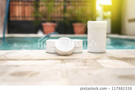 Close up of chlorine tablets for pool cleaning, chlorine tablets to clean pools, concept of chlorine tablets to sanitize pools 117882338