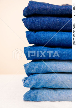 Jeans in various fading stages Jeans in various fading stages 117883070