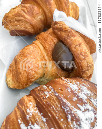 Chocolate croissants Chocolate croissants 117883154