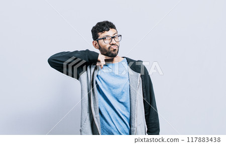 A person threatening to kill, Person threatening with a finger to the throat, A man with a violent look making threatening signs A person threatening to kill, Person threatening with a finger to the throat, A man with a violent look making threatening signs 117883438