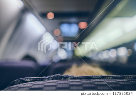 Crop image of airplane screen device for entertainment to serve passenger. Flying with airplane. Travel concept. Crop image of airplane screen device for entertainment to serve passenger. Flying with airplane. Travel concept. 117885024