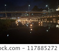 Candlelit riverbank 117885272
