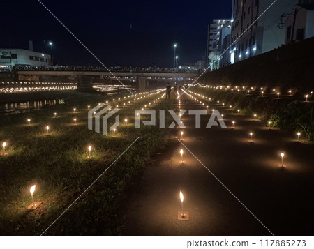 Candlelit riverbank 117885273