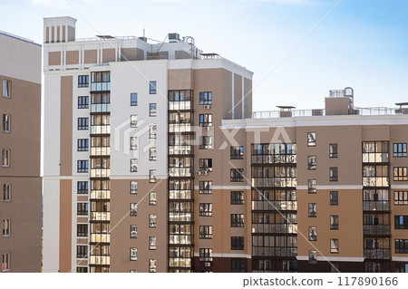Modern apartment buildings with multiple windows and balconies. Modern apartment buildings with multiple windows and balconies. 117890166