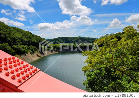 Red bridge and blue sky 117891305