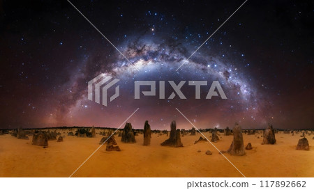 Milky Way over desert pinnacles. 117892662