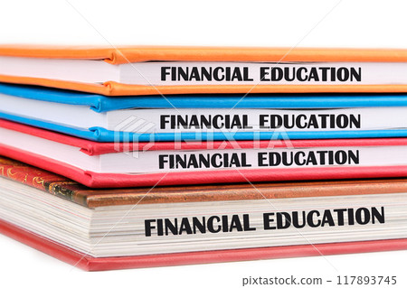 Business Financial education concept. Copy space. Concept words FINANCIAL EDUCATION phrase is repeated on the ends of the notebook 117893745