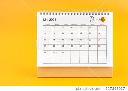 December 2024, Monthly desk calendar for 2024 year on yellow background. December 2024, Monthly desk calendar for 2024 year on yellow background. 117893927