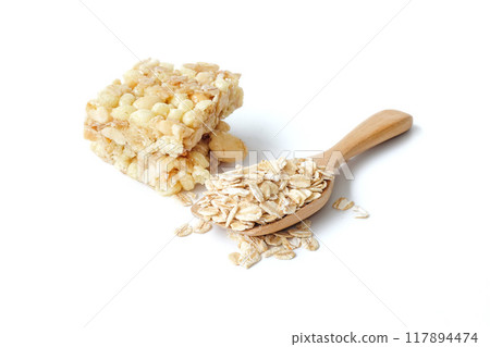 Muesli bar or granola bar with oat flakes isolated on white background. 117894474
