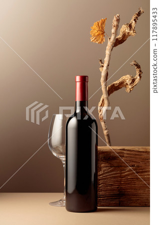 Bottle of red wine with a composition of old wood. Bottle of red wine with a composition of old wood. 117895433