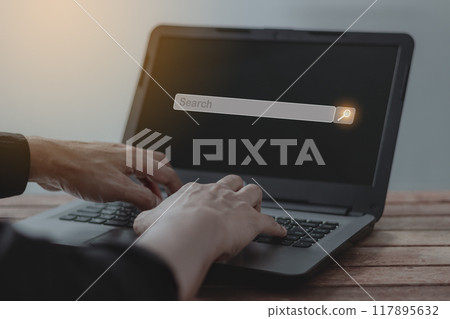 Young man hand with laptop touching search bar, Search job Young man hand with laptop touching search bar, Search job 117895632