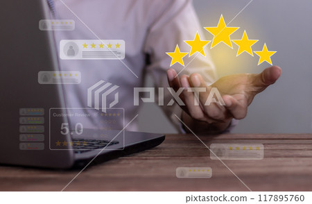 Excellence Review, Young Man with laptop hand holding five star to review and give 5 stars  117895760