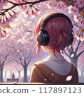 Back view of a woman wearing headphones and listening to music while watching the cherry blossoms 117897123