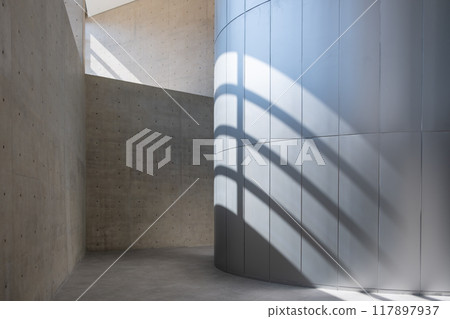 Abstract, minimalist, modern architectural space with concrete walls and curved element Abstract, minimalist, modern architectural space with concrete walls and curved element 117897937