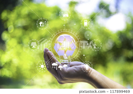 eco friendly energy. Innovation technology eco green concept. Icon bulb energy sources for renewable on green blur background.Concept with innovation inspiration. Idea innovative from the big data. 117899469