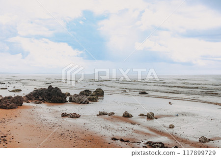 Red sand cliff beach in Chumphon, Thailand. Red sand cliff beach in Chumphon, Thailand. 117899729