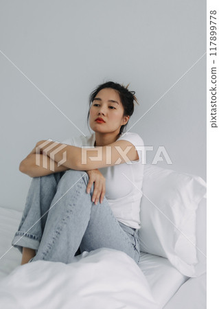 Sad and depressed woman stay alone in the room. Sad and depressed woman stay alone in the room. 117899778