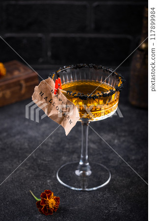 Halloween cocktail orange pumpkin martini Halloween cocktail orange pumpkin martini 117899984