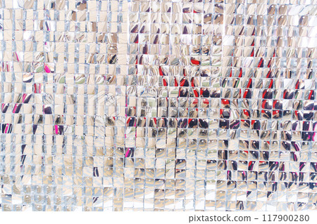 A wall with silver sequins to decorate the interior.  117900280