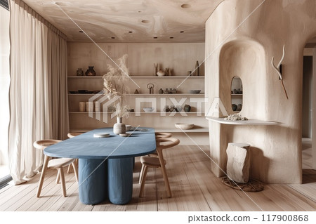 A dining room with an organic-shaped blue table, light wood floor, and walls made of clay in neutral tones. A dining room with an organic-shaped blue table, light wood floor, and walls made of clay in neutral tones. 117900868