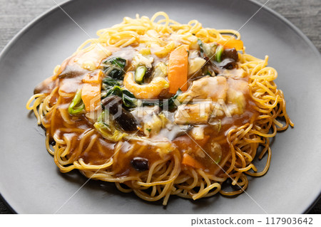 Delicious Chinese food, frozen mixed vegetable fried noodles with thickened sauce 117903642