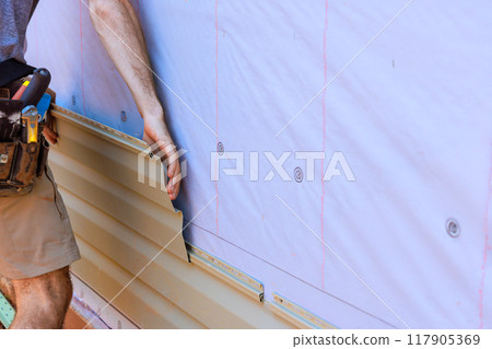 During construction of new residence, handyman installed vinyl PVC siding 117905369