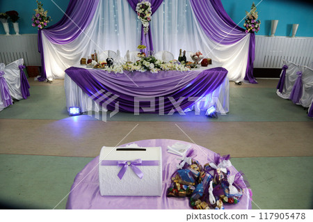 Restaurant interior for a wedding banquet. 117905478