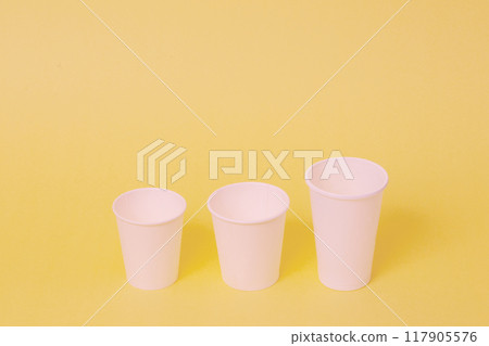 photo of three disposable cups. photo of three disposable cups. 117905576