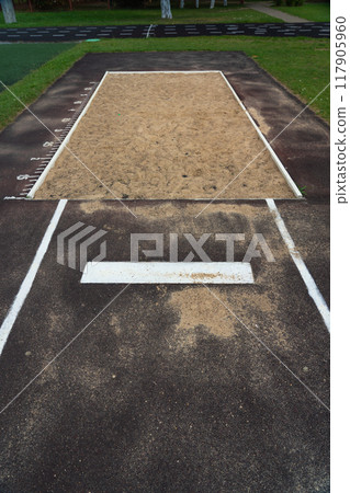 The jump pit at the school stadium. Long jump in the sand 117905960