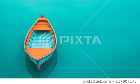 Lonely wooden boat floating on turquoise water Lonely wooden boat floating on turquoise water 117907175