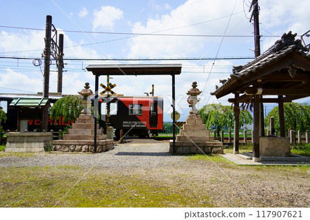 A train on the Sangi Railway Hokusei Line passing in front of Shimokasada Hachiman Shrine (Inabe City, Mie Prefecture) A train on the Sangi Railway Hokusei Line passing in front of Shimokasada Hachiman Shrine (Inabe City, Mie Prefecture) 117907621
