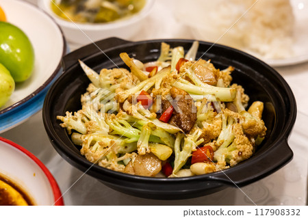 Simple and authentic Sichuan cuisine of fried cauliflower with slices of pork meat 117908332