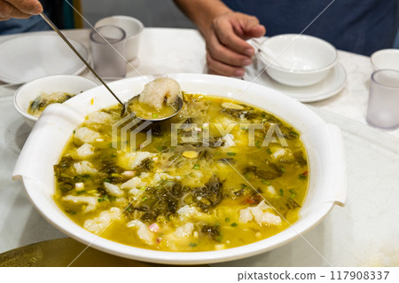 Simple and authentic Sichuan cuisine of preserved vegetable and seaweed soup with slices of fish meat Simple and authentic Sichuan cuisine of preserved vegetable and seaweed soup with slices of fish meat 117908337