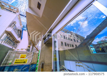 Tokyo cityscape in Japan, Shibuya Station West Exit. The West Exit Underground Walkway is now open...From the underground to Sakura Stage...=August 1st Tokyo cityscape in Japan, Shibuya Station West Exit. The West Exit Underground Walkway is now open...From the underground to Sakura Stage...=August 1st 117908575